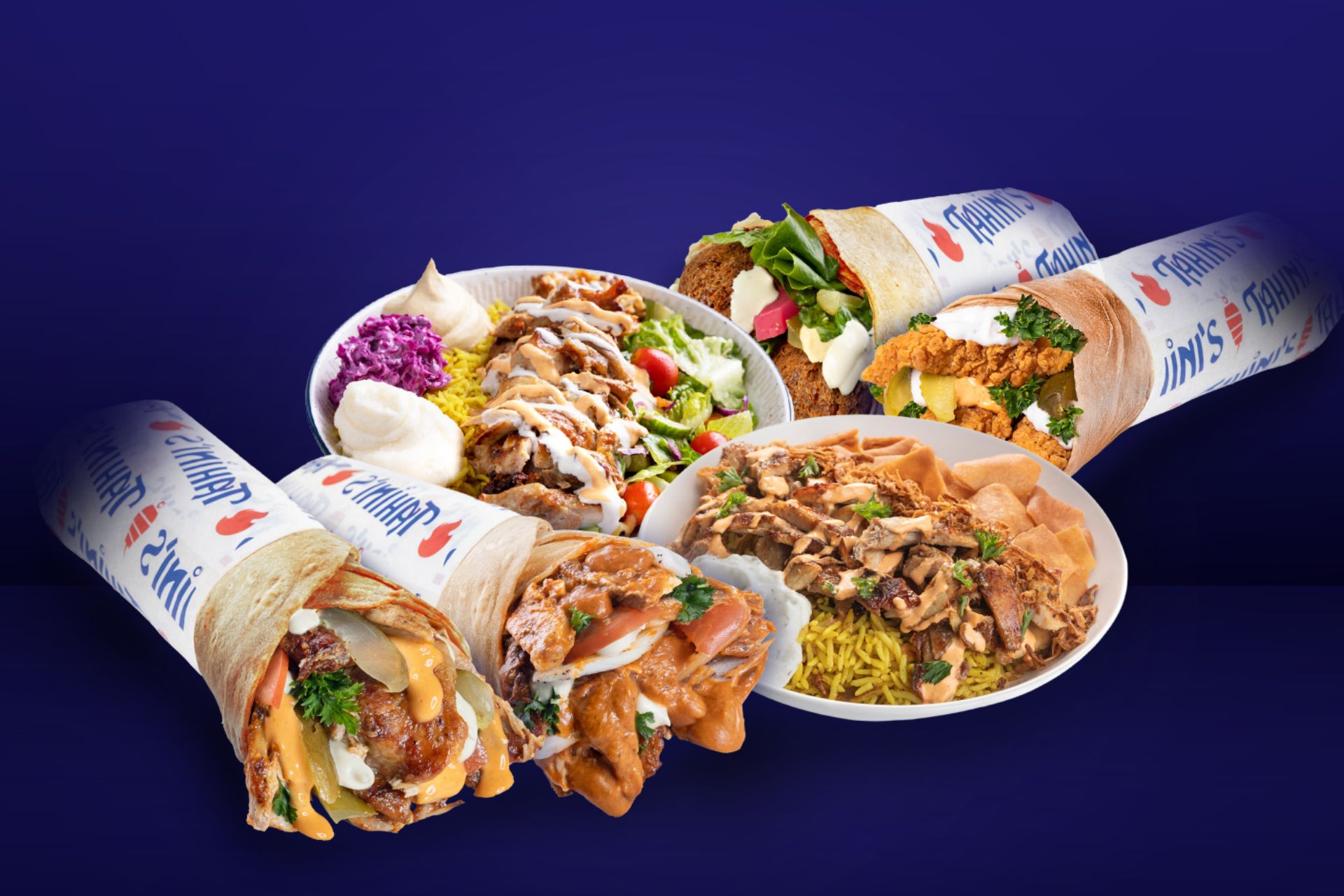 An assortment of Tahini's Mediterranean dishes, including wrapped shawarmas, falafel wraps, and rice bowls drizzled with sauces against a dark blue background.